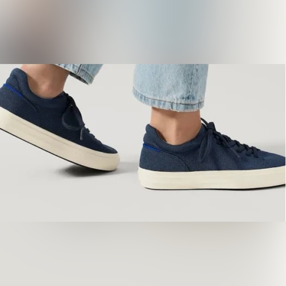 Rothy’s 
The RS02 Sneaker
Navy  Women’s Size: W 11
(Men’s size 9.5)